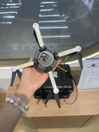 Aerodynamic lighting hovering unmanned aerial vehicle (UAV) for outdoor camping Aerodynamic lighting hovering unmanned aerial vehicle (UAV) for outdoor camping